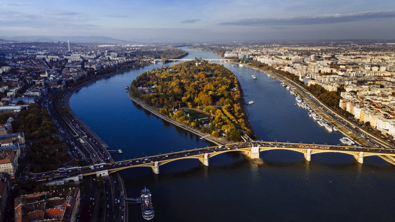 Scenic aerial view of Margaret Island and the Danube River in Budapest, Hungary, during autumn.
